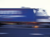Blurred Speeding Semitrailer Truck Races Along the Highway, Australia Photographic Print by Jason Edwards