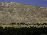 Buddhist Stupas at the Base of a Mountain, Qinghai, China Photographic Print by David Evans