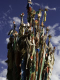 Cluster of Tibetan Prayer Flags against a Blue Sky with Clouds, Qinghai, China Photographie par David Evans