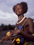 Hamer Man in Traditional Beads, Armed with Ak-47 Rifle, Ethiopia Photographie par David Pluth