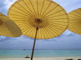 Beach from Underneath Yellow Umbrellas at the Amanpuri Hotel Impressão fotográfica por Jodi Cobb Beach from Underneath Yellow Umbrellas at the Amanpuri Hotel Impressão fotográfica por Jodi Cobb