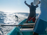 Hand Lining for Tuna in the Pacific Off the Coast of Puerto Angel, Mexico Photographic Print by Michael S. Lewis