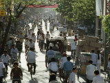 Cyclists and Pedestrians on a Busy Guangzhou Street, China Photographic Print by James L. Stanfield