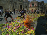 Fire Starts in a Pile of Confetti and Streamers During the Celebration of Saint Paolo, Italy Fotografisk trykk av Sisse Brimberg