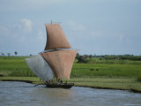 Fishermen Sail Upstream Along the Bank of the Meghna River Photographic Print by James P. Blair