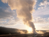 Old Faithful Geyser Erupts at Sunrise, Yellowstone Photographic Print by Michael S. Lewis