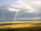 Rainbows Form over the Serengeti Plains, Tanzania Photographic Print by Michael Fay