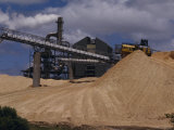 Logging Wood Chip Mill and a Tractor Atop a Vast Mound of Pulp, Australia Photographic Print by Jason Edwards