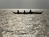 Local Fishing Boat Returning to Malapascua Island at Sunrise, Philippines Photographic Print by Tim Laman