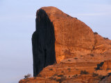 Light on a Mini Half Dome Rock Formation in Canyonlands, Utah Photographic Print by Rich Reid