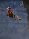 Man Falling While Rock Climbing in Wyoming Photographie par Bobby Model