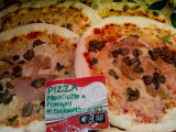 Pizza Displayed for Sale at a Market in Venice, Italy Photographic Print by Todd Gipstein