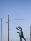Model Dinosaur on Interstate 40, Arizona USA Photographie par John Burcham