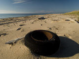 Old Discarded Tire on a Beach, Block Island, Rhode Island Photographic Print by Todd Gipstein