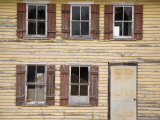 Peeling Paint on Shuttered, Abandoned Home on Chesapeake Bay Photographie par David Evans