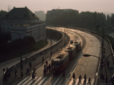 Pedestrians and Trams in Warsaw, Poland Photographic Print by James L. Stanfield