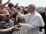 Pope John Paul II Greets a Crowd of People in St. Peter's Square Photographic Print by James L. Stanfield