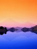 The Virunga Mountains Rise above Lake Mutanda, Uganda Photographie par David Pluth