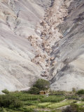 Landslide Boulders Perched Threateningly above Small Building, Chile Photographie par David Evans