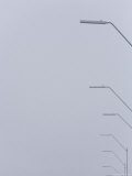 Street Lights against a Overcast Sky Photographie par John Burcham