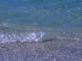 Small Wave Ripples Onto Shore, Holmes Beach, Florida Photographie par Stacy Gold