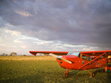 The Cessna Makes a Pit Stop to Refuel on the Serengeti, Tanzania Photographie par Michael Fay