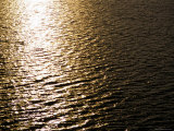 The Sun Reflects Off Rippling Water, Alaska Photographic Print by Stacy Gold