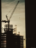 Silhouette Crane at a Skyscraper Construction Site, New York Photographic Print by Ira Block