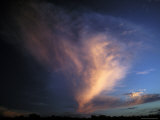 The Rising Sun Reflects Pink Onto an Unusual Cloud Formation, Australia Photographie par Jason Edwards