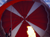 The Red Canopy of a Hot Air Balloon Taking-Off, with Gas Jet Flame, Australia Photographie par Jason Edwards