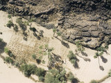 Small Wells Can Transform Patches of Sand into Patches of Food, Niger Fotografisk tryk af Michael Fay