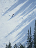 Skier Glides Across a Pine-Shadowed Slope at Deer Valley Resort, Utah Photographic Print by James P. Blair