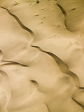 Windswept Dunes Along the Coast of the Atlantic Ocean, Namibia Photographie par Michael Fay