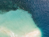 Waves Break on a Reef Out in the Zanzibar Channel, Tanzania Photographie par Michael Fay
