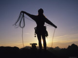 Women Coils a Climbing Rope in the Mountains of Idaho Photographie par Bobby Model
