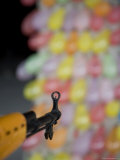 Sites of Toy Rifle Points at Colored Balloons of Chinese Street Game, Chongqing, China Photographie par David Evans