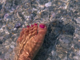 Woman's Foot in the Warm Water of the Gulf of Mexico, Holmes Beach, Florida Photographie par Stacy Gold
