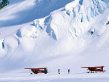 Two Bush Pilots Stand Outside their Planes on a Glacier, Alaska Photographie par Kate Thompson