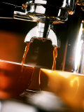Two Cups Under a Coffee Machine Photographic Print by Ludger Rose