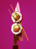 Two Maki-Sushi with Avocado and Salmon on Knife Photographic Print by Hartmut Kiefer
