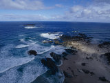 Waves Smashing Onto a Rugged Remote Coastline Beneath Storm Clouds, Australia Photographie par Jason Edwards