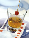 Manhattan in Whisky Glass, Cocktail Cherry on Cocktail Stick Photographic Print by Michael Brauner