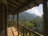 Wooden Balcony of Venezuelan House with View of Andean Cloud Forest Photographic Print by David Evans