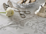 White Hemstitch Tablecloth with Ranunculus and Cake Tongues Photographic Print by Roland Krieg