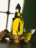 Olive Oil with Slices of Bread Photographic Print by Luzia Ellert