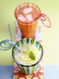Ice-Cold Lemonade and Pink Grapefruit Juice in Glasses Fotografie-Druck