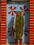Woman in a Beautifully Patterned Long Headshawl and Pants Framed by a Painted Doorway Photographic Print by James L. Stanfield