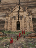 Young Buddhist Monks near a Ruined Temple in Laos Photographic Print by Paul Chesley