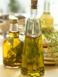 Oil with Herbs and Spices in Two Bottles Photographic Print by Alena Hrbkova
