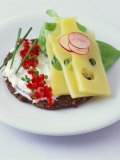 Cheese and Pumpernickel Snacks Photographic Print by Jörn Rynio